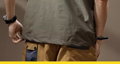 Men's khaki short-sleeve polo shirt with a lapel collar, three buttons, and a large flap chest pocket with a D-ring. - Image 17