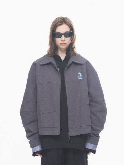 Chaqueta de Cuero Patchwork con Detalles en Relieve Geométrico - Image 11