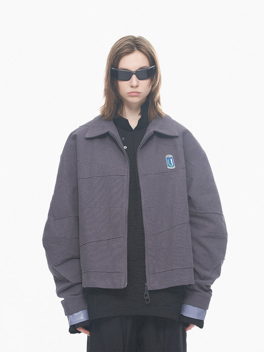 Chaqueta de Cuero Patchwork con Detalles en Relieve Geométrico - Image 11