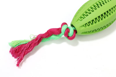 Green rubber pet molar toy with a football shape and textured surface, featuring red and green braided rope knots. - Image 10