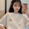 Playera Suelta con Estampado Bordado de Manga Corta