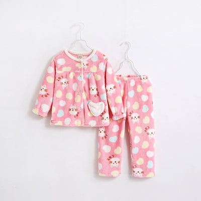 Pink flannel girls' pajamas with seashell and starfish patterns, featuring a button-up top and matching pants. - Image 4