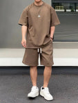 Khaki men's short-sleeved t-shirt and matching shorts set, featuring a loose fit and white drawstring. - Image 2