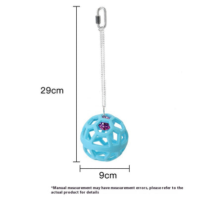 Orange hollow rubber ball bird toy with a pink bell inside, hanging from a silver chain and carabiner clip. - Image 8