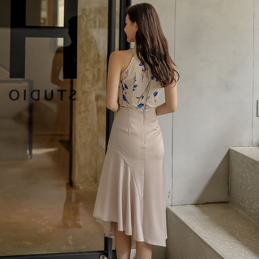 Conjunto Elegante: Blusa Sin Mangas Estampada y Falda Tableada con Abertura - Image 5