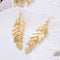 Aretes Largos de Borla y Hoja - Diseño Europeo Minimalista