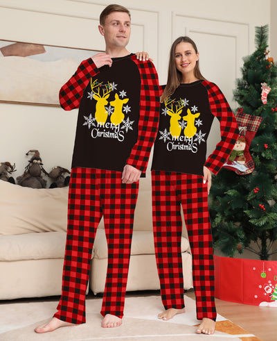 Two children in matching black and red buffalo plaid Christmas pajamas with golden deer and "Merry Christmas" print. - Image 8
