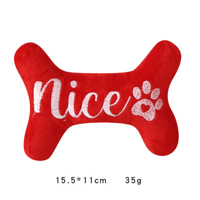 Green plush bone dog toy with "Naughty" embroidered in white, featuring a white paw print. - Image 5