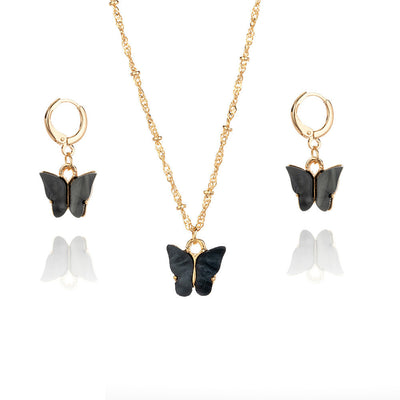 Pink acrylic butterfly necklace and earring set with gold-colored chain and hoop earrings. - Image 7