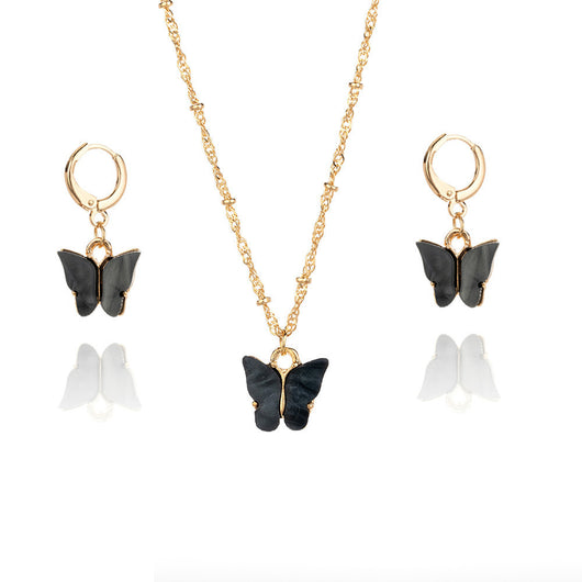 Pink acrylic butterfly necklace and earring set with gold-colored chain and hoop earrings. - Image 7