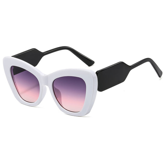 Pink cat-eye sunglasses with green temples and brown to pink gradient lenses on a white background. - Image 3