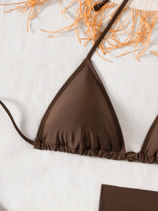 Solid brown three-piece bikini swimsuit set with a triangle top, beaded accessory, and matching sarong skirt. - Image 15