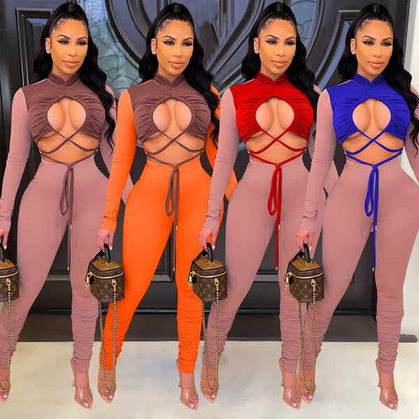 Jumpsuit Elegante de Manga Larga con Detalles Calados y Combinación de Colores