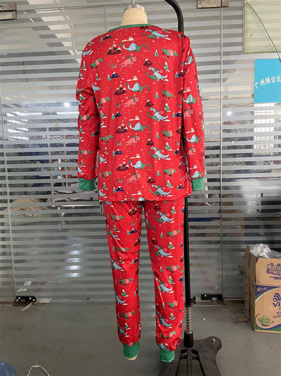 Red long-sleeved men's pajama set with a festive dinosaur and Christmas tree print, featuring green cuffs. - Image 24