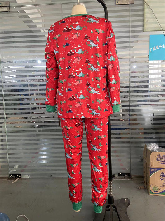 Red long-sleeved men's pajama set with a festive dinosaur and Christmas tree print, featuring green cuffs. - Image 24