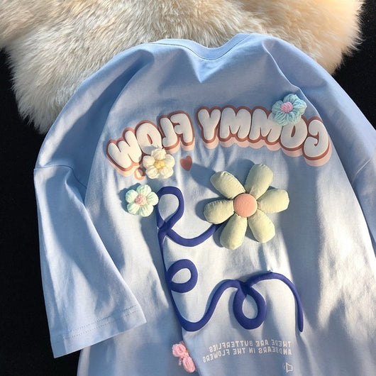 Playera Estampada con Letras Florales y Espuma - Image 22