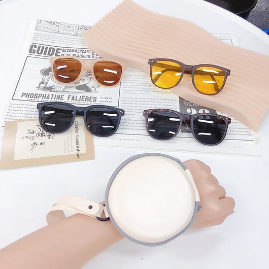 Light brown foldable women's sunglasses with round frames and brown polarized lenses on a white background. - Image 16