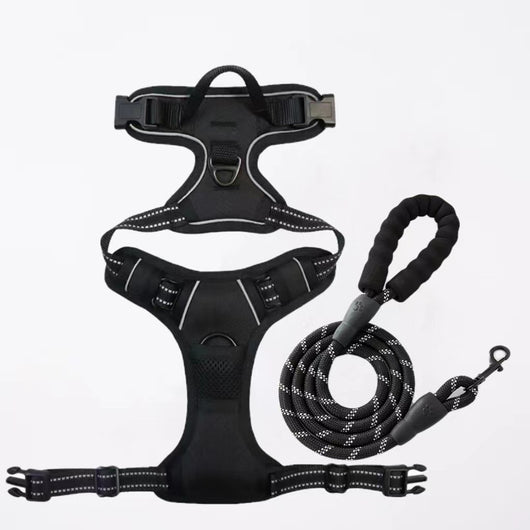 Red and black dog harness with reflective strips, adjustable straps, and a top handle for secure pet control. - Image 18