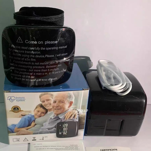 Black wrist sphygmomanometer with a digital display showing blood pressure and pulse readings, and a gray wrist cuff. - Image 6