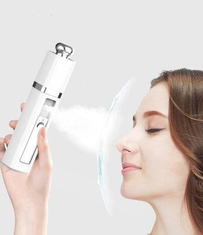 Pink USB Power Bank Nano Spray Moisturizer with silver accents, featuring a power button and sleek design.