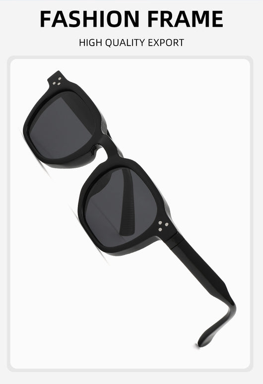 Black square frame sunglasses with dark lenses and small silver accents on the front, shown at an angle. - Image 9