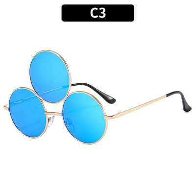 Red lens round sunglasses with a gold metal frame and an extra small round lens above the left eye. - Image 4