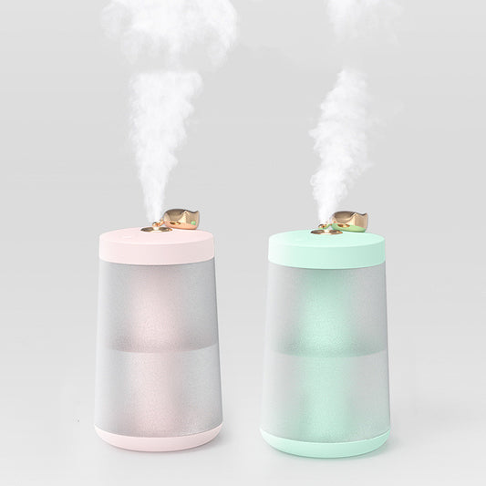 Cute cat-themed USB desktop humidifier with a pink top and base, frosted clear body, and gold cat ear accent. - Image 2
