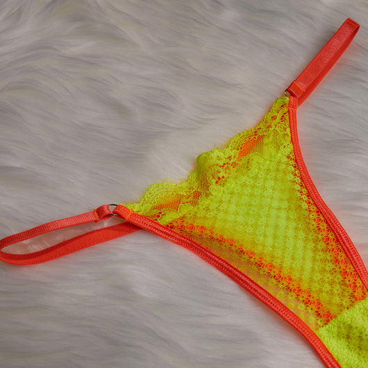 Neon yellow and orange lace lingerie set with chain details, including a bra, garter belt, thong, and armbands. - Image 30