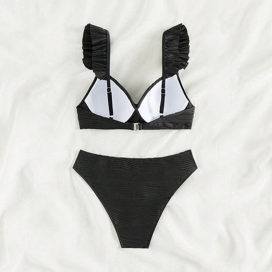 Black ruched high-waisted bikini swimsuit with ruffled shoulder straps and a twisted front detail. - Image 4