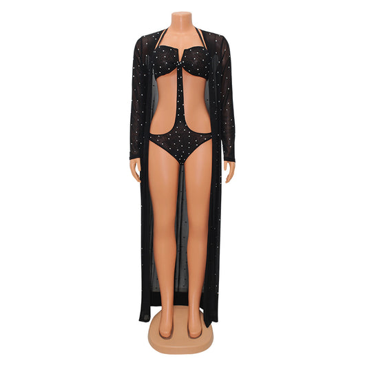 Woman in black mesh see-through long sleeve swimsuit cape over a matching cutout bandeau swimsuit with hot drilling. - Image 6
