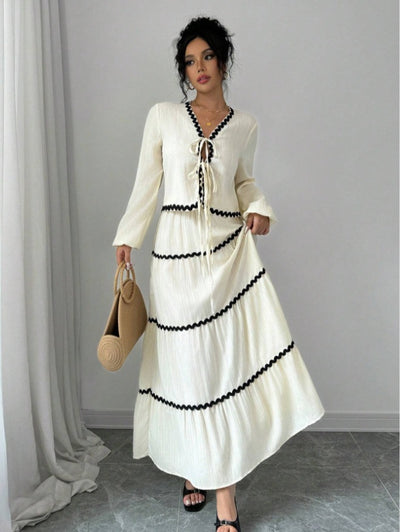 Conjunto Elegante con Blusa de Encaje y Falda Plisada con Mangas Farol - Image 18