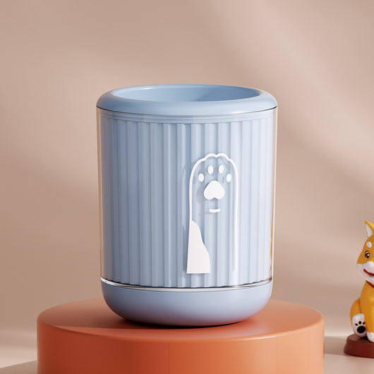 Light blue pet foot washing cup with a white paw print design, ribbed texture, and smooth base. - Image 15