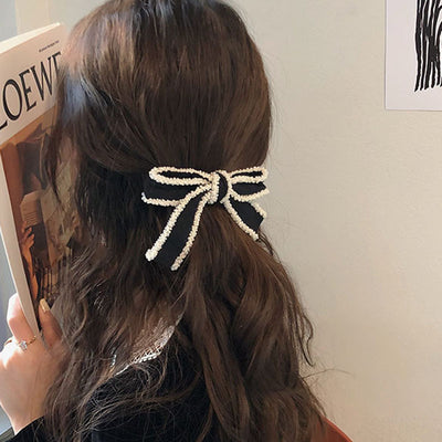 Diadema Elegante con Moño Blanco y Detalles Perlados - Image 11