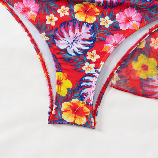 Woman in a red multicolor floral print three-piece swimsuit with high-waisted bikini and long-sleeve cover-up, straw hat, and sunglasses on a beach. - Image 25