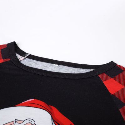 Christmas pajama set with a black long-sleeve top featuring a Santa head in American flag sunglasses and red and black buffalo plaid pants. - Image 17