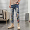 Jeans Slim Fit con Bordado de Logo para Hombre