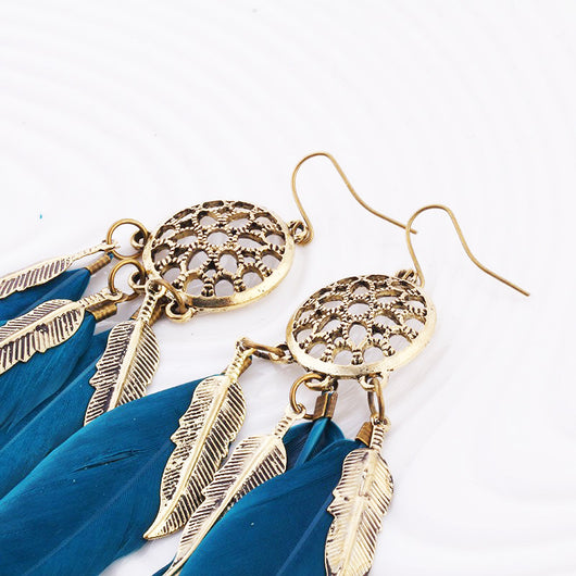 Aretes Largos con Borlas Elegantes - Image 4