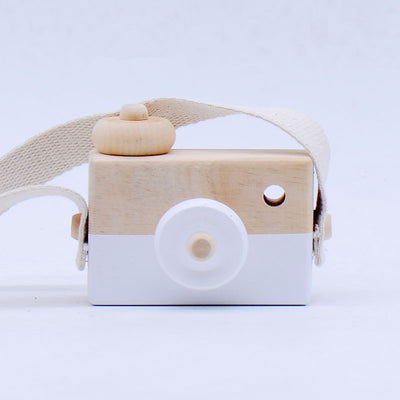 Two-tone wooden toy camera in natural wood and light blue with a cream fabric strap, for babies and kids. - Image 8