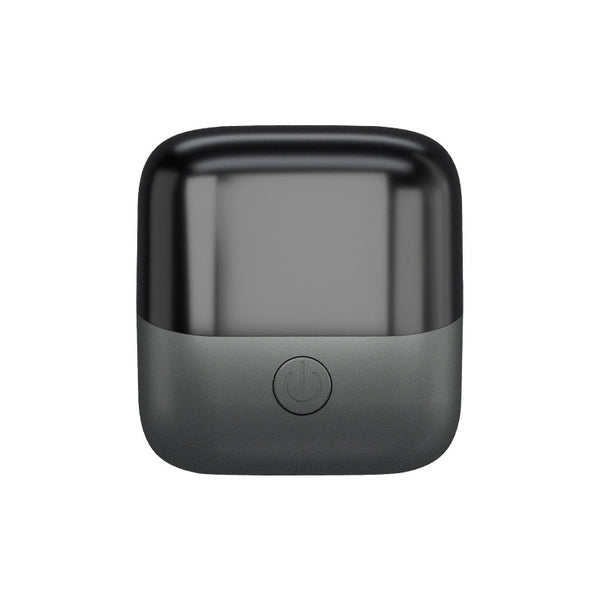 Silver mini electric shaver with a double-headed rotary design and a black power button on top. - Image 6