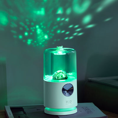 Light blue smart rotary projection humidifier with a clear water tank and a cute cat-shaped top.