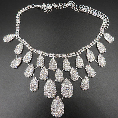 Sparkling silver-tone necklace with multiple teardrop-shaped rhinestone pendants, ideal for wedding or evening wear. - Image 4