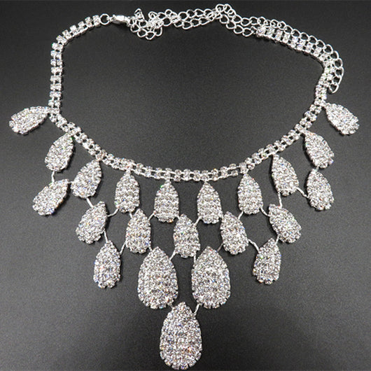 Sparkling silver-tone necklace with multiple teardrop-shaped rhinestone pendants, ideal for wedding or evening wear. - Image 4