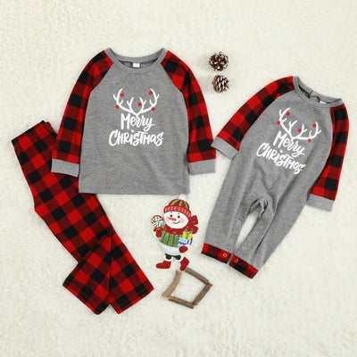 Family Christmas pajama set with grey long-sleeve tops featuring "Merry Christmas" and reindeer antlers, paired with red and black buffalo plaid pants. - Image 2