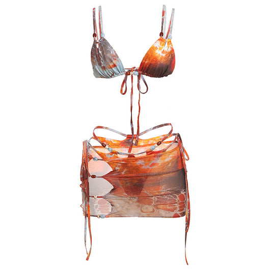 Women's fashionable three-piece bikini set with an abstract orange, brown, and blue print. Features a triangle top, mesh mini skirt, and lace-up details with be - Image 6
