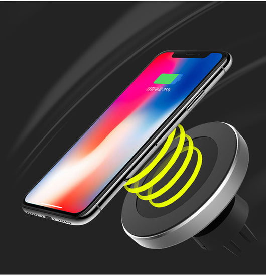 Silver and black car magnetic wireless charger with a blue indicator light, mounted on a car's air vent. - Image 10