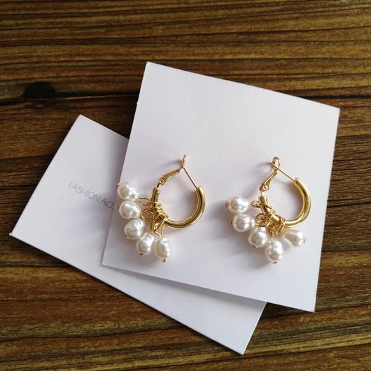 Pendientes Elegantes de Perla y Borla - Image 5