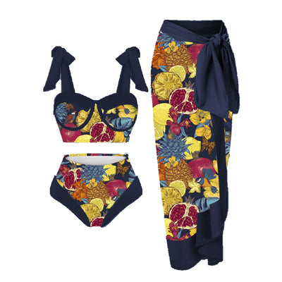 Women's three-piece swimsuit with tropical pomegranate, hibiscus, and bird print bikini and magenta sarong.