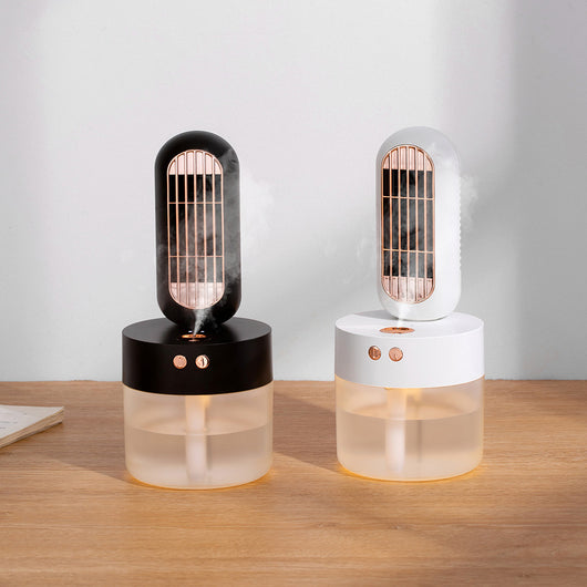 Small white and rose gold humidifier fan with an oval fan unit and a translucent cylindrical water tank.