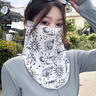 Black paisley sun mask with white pattern and ear loops, covering the lower face and neck, worn outdoors. - Image 3