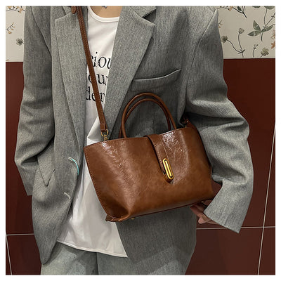 Bolso Bucket de Cuero Encerado Elegante y Portátil - Image 18